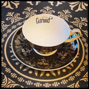 Black Nouveau Cursed cup and saucer