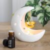 white crescent moon oil burner with metal dish
