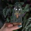 jeweled mantis in jar
